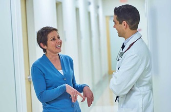 Doctor and administrator talking